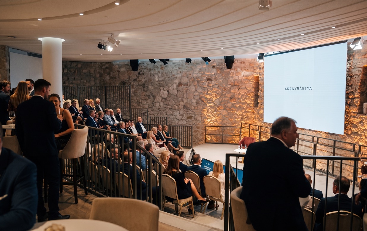 Conference in the theater hall of the “ Aranybástya ” in Buda Castle, in front of the illuminated bastion wall from the Ottoman era