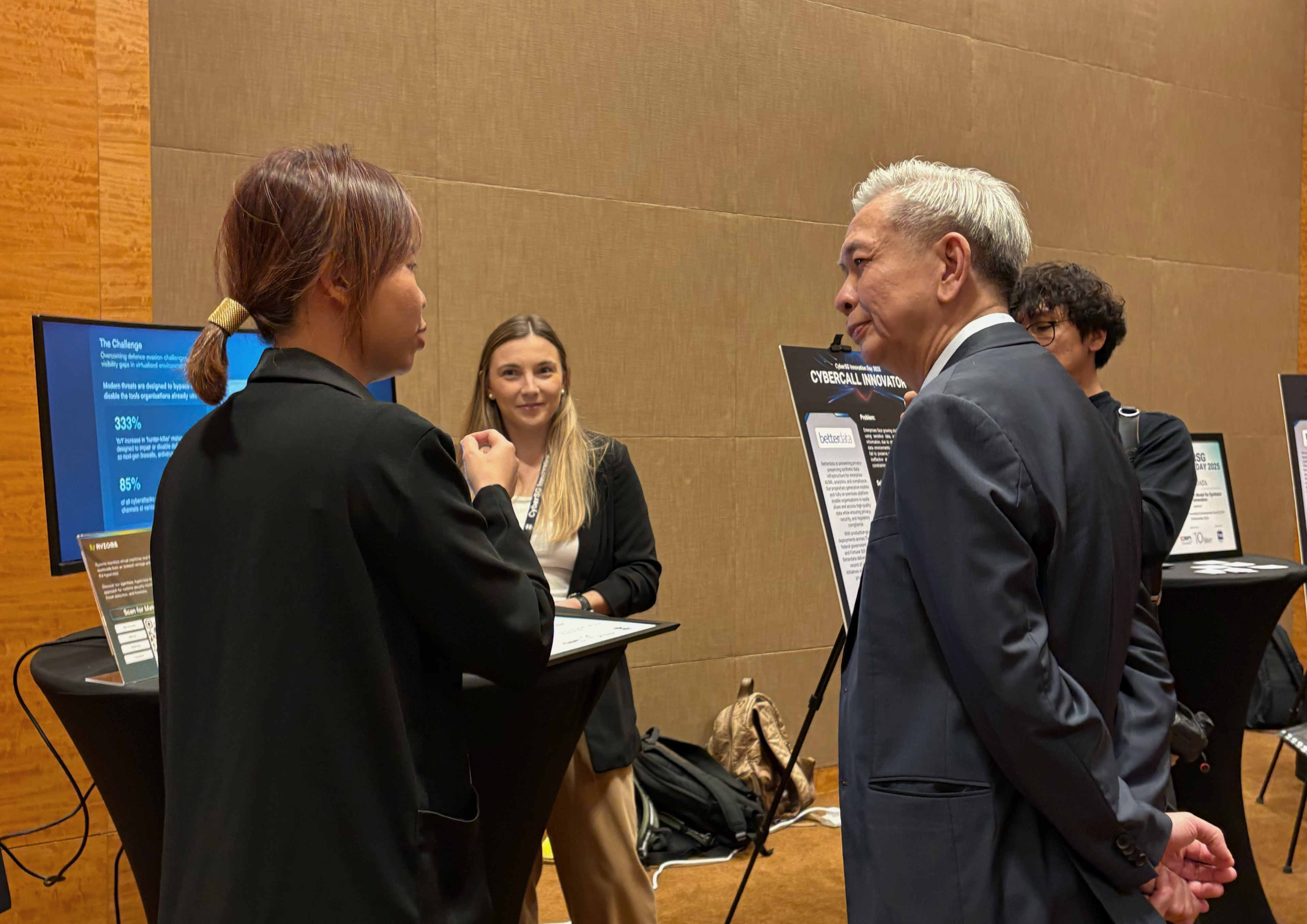 Gloria Lee, COO at Ryzome, introducing Ryzome to Mr David Koh, the Commissioner of Cybersecurity and Chief Executive of the Cyber Security Agency (CSA) of Singapore, during CyberSG Innovation Day 2025