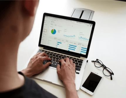 Person typing on laptop