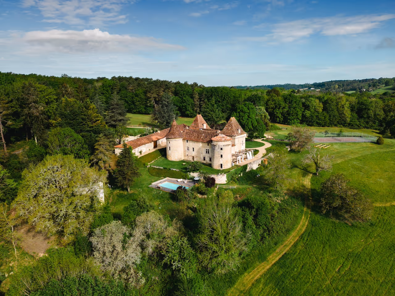 One of the crown jewels of Périgord, Chateau de Belet, atop its hilltop estate