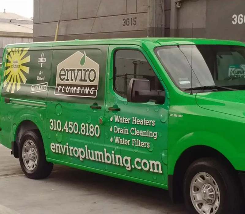 Drain inspection technician using high-resolution drain cameras to locate cracks and blockages in underground pipe system.