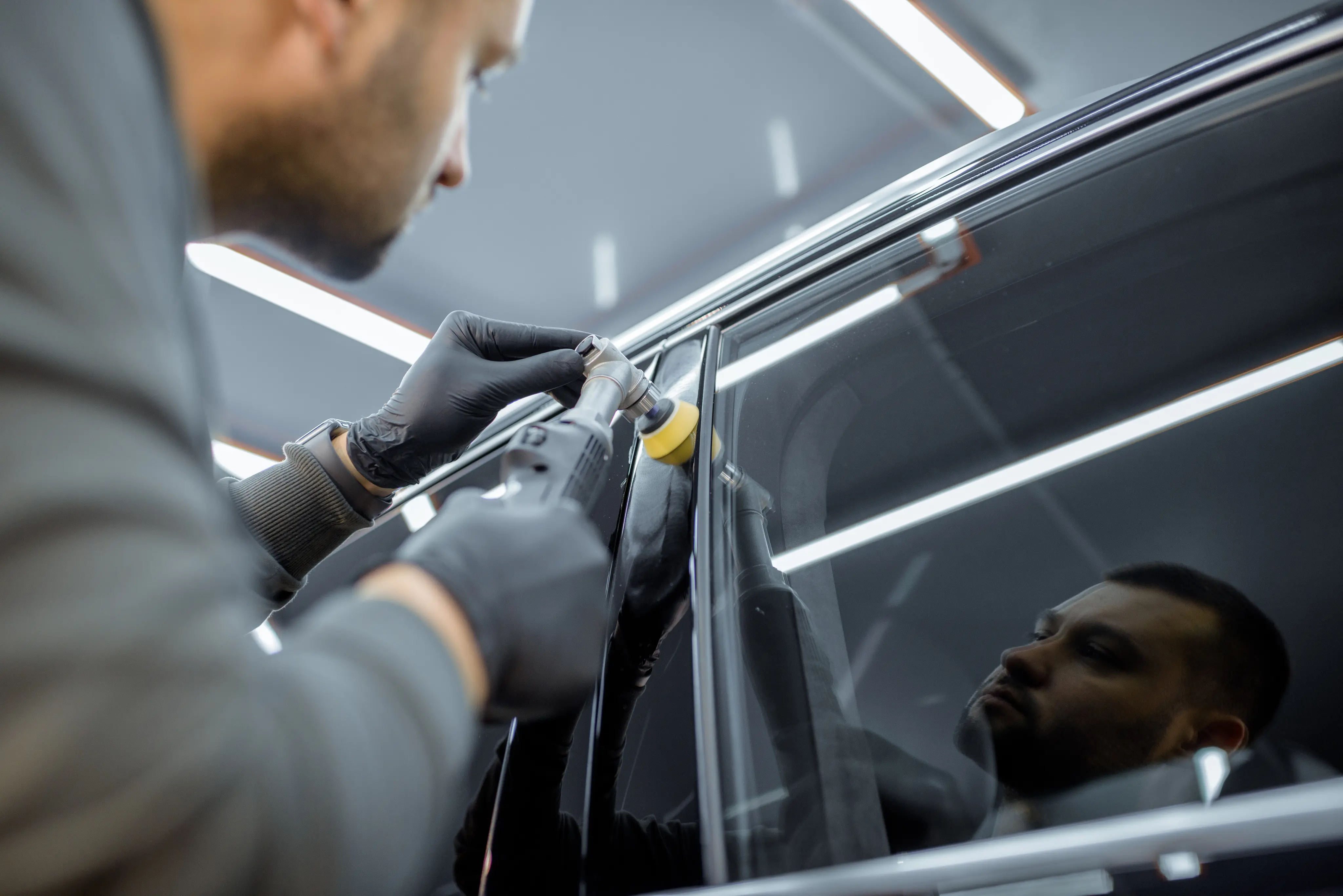 A man work on a Car