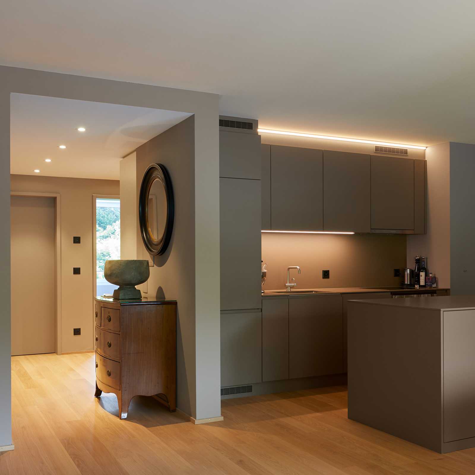 Refurbishment of a residential building with newly constructed duplex flats on the top floor.