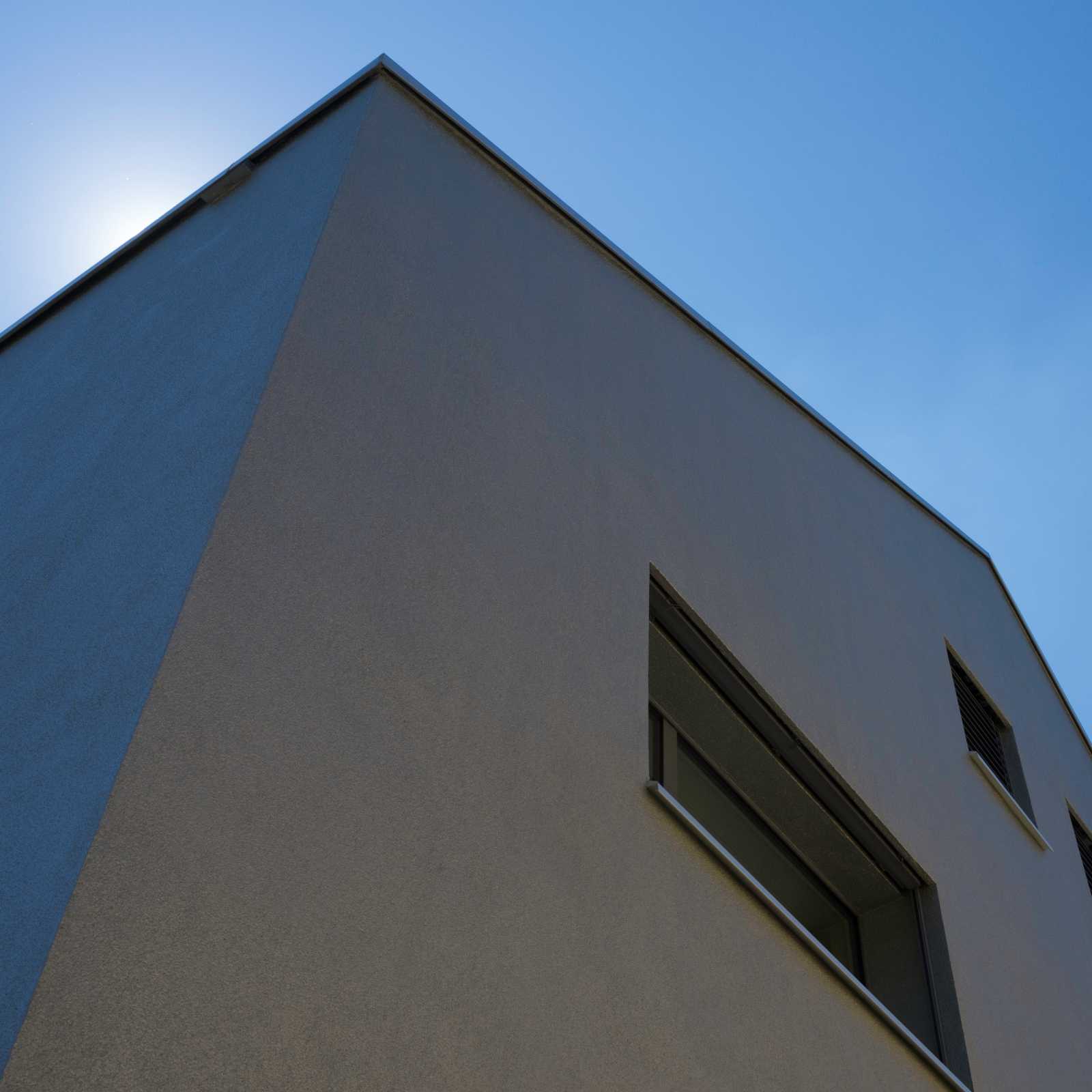 Renovation of the building envelope of an apartment block with enlargement of the balcony areas.