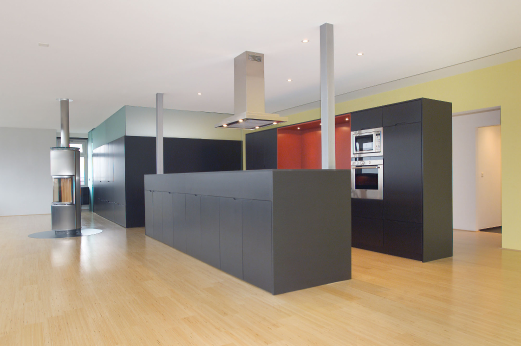 Penthouse appartment with open-plan layout in a central location above the rooftops of Basel.