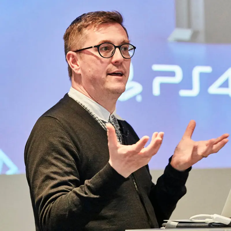 Dave Ranyard speaking at a games industry event