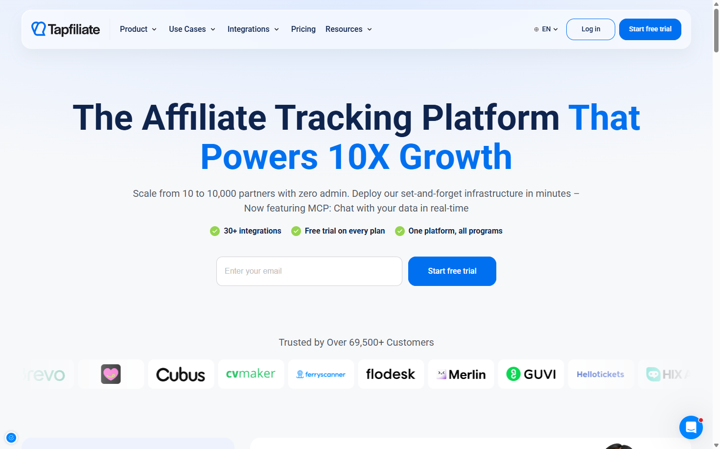 Tapfiliate homepage promoting affiliate tracking, with a headline about powering growth and a free trial signup form.