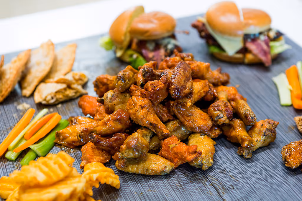 Chicken wings, fries, and sandwiches from Atomic Wings