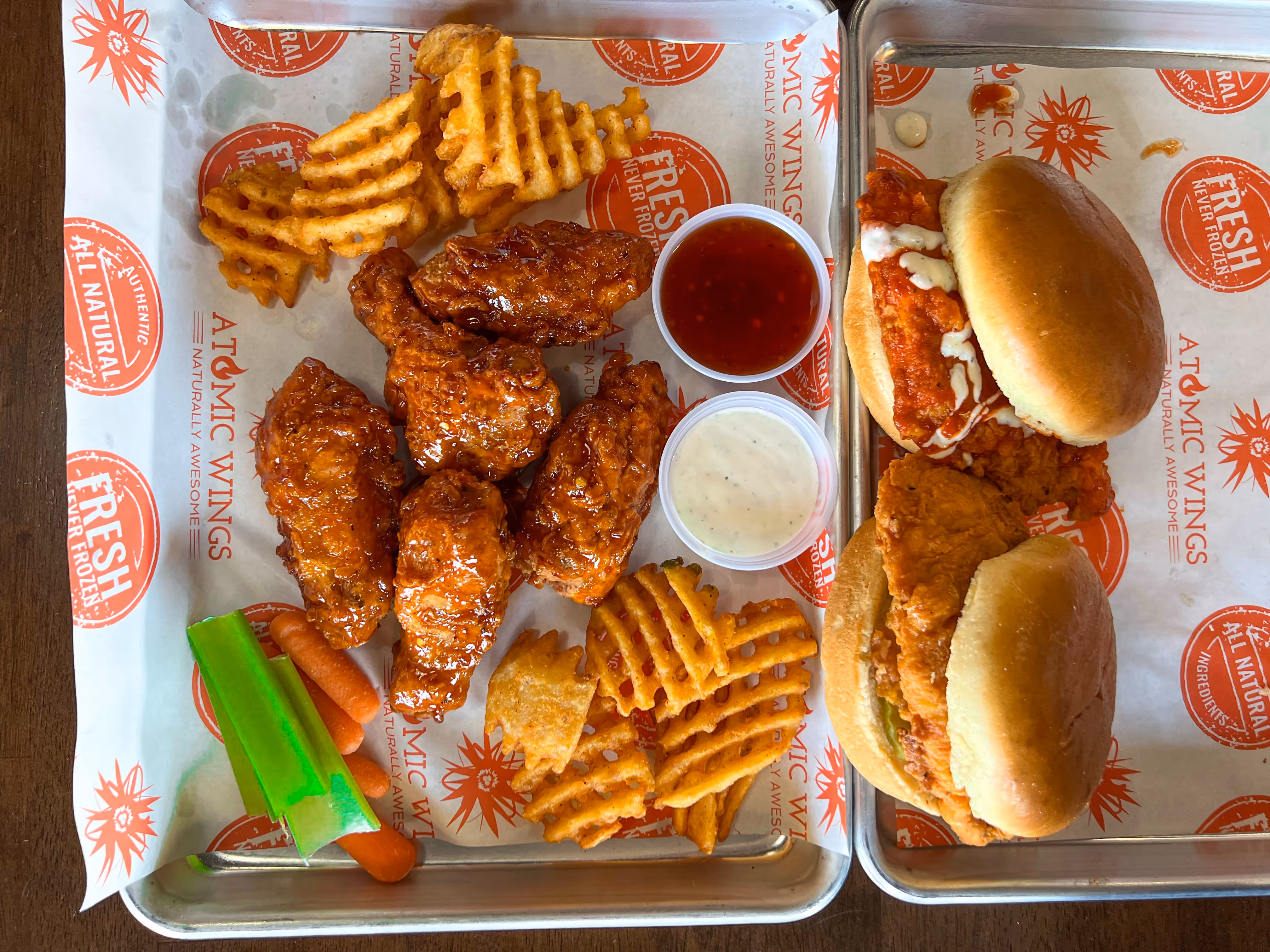 Order from Atomic Wings with chicken wings, chicken sandwiches, and dipping sauces