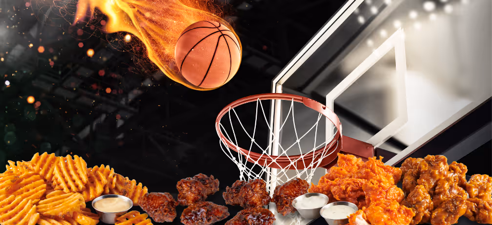 Shooting a flaming basketball through a basketball hoop with Atomic Wings below
