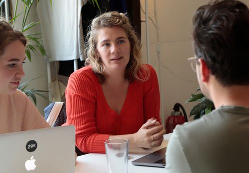 Three people during an interview