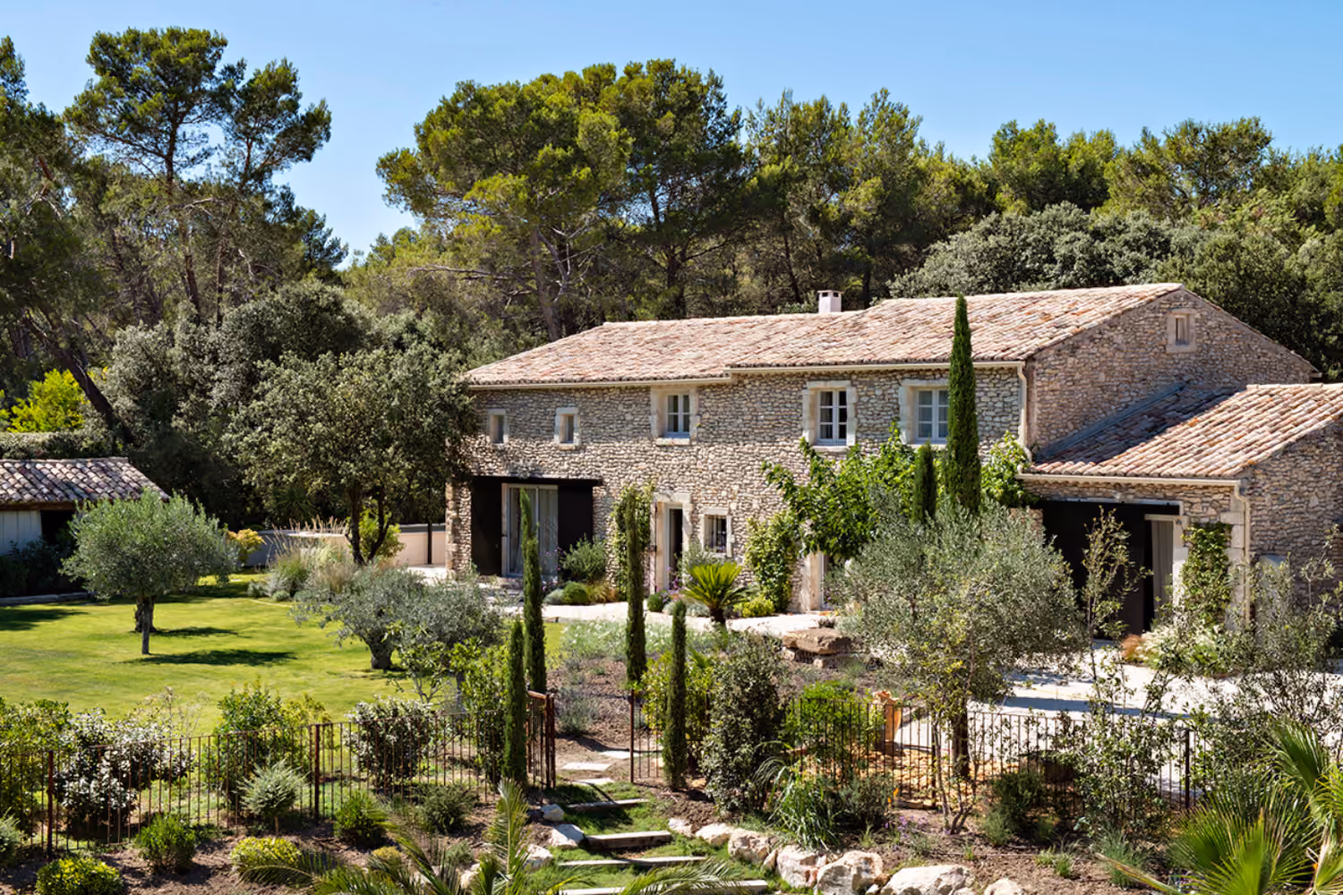 Natural stone home surrounded by nature