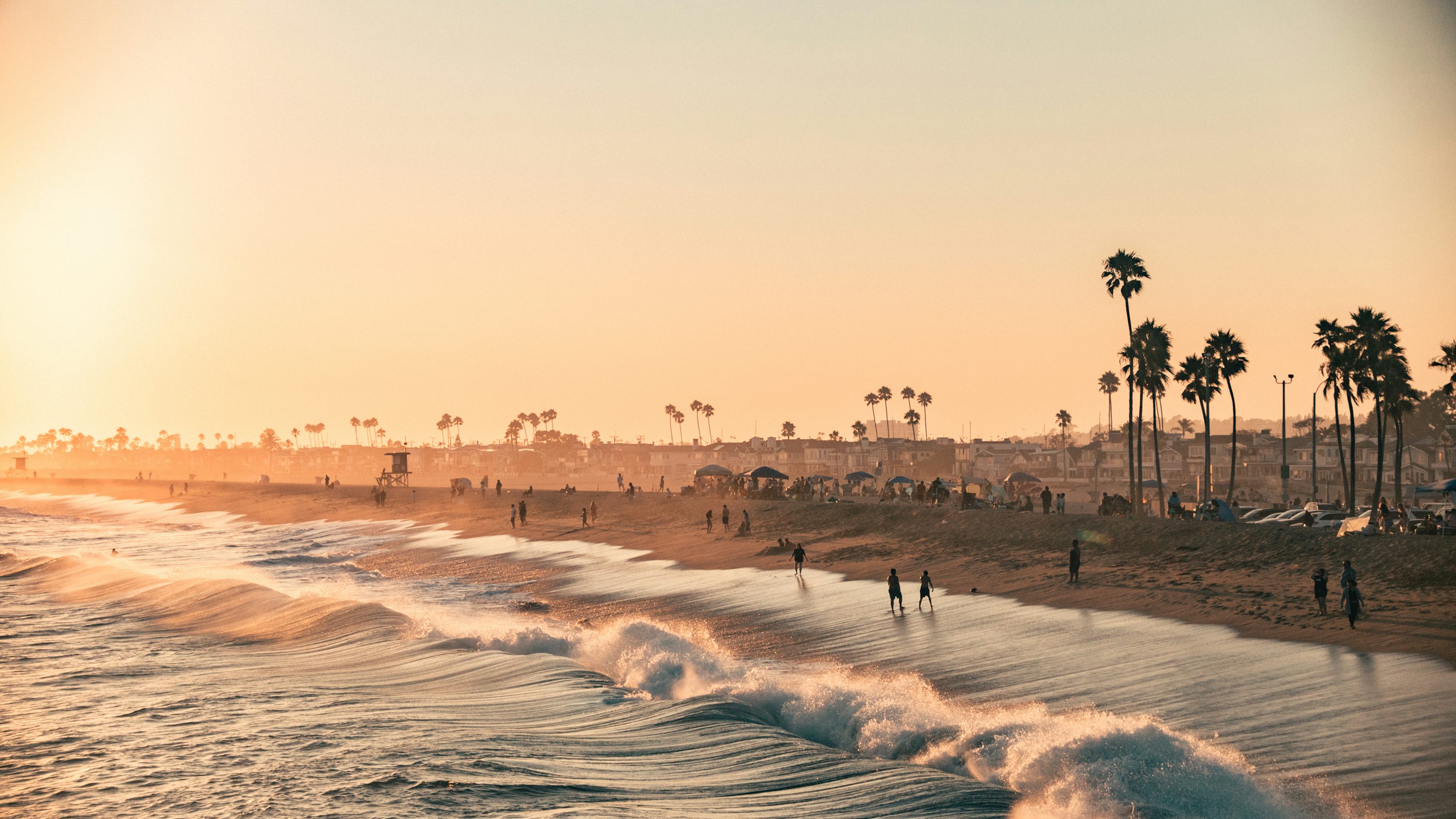 Balboa Pier beach at sunset in Newport Beach, California