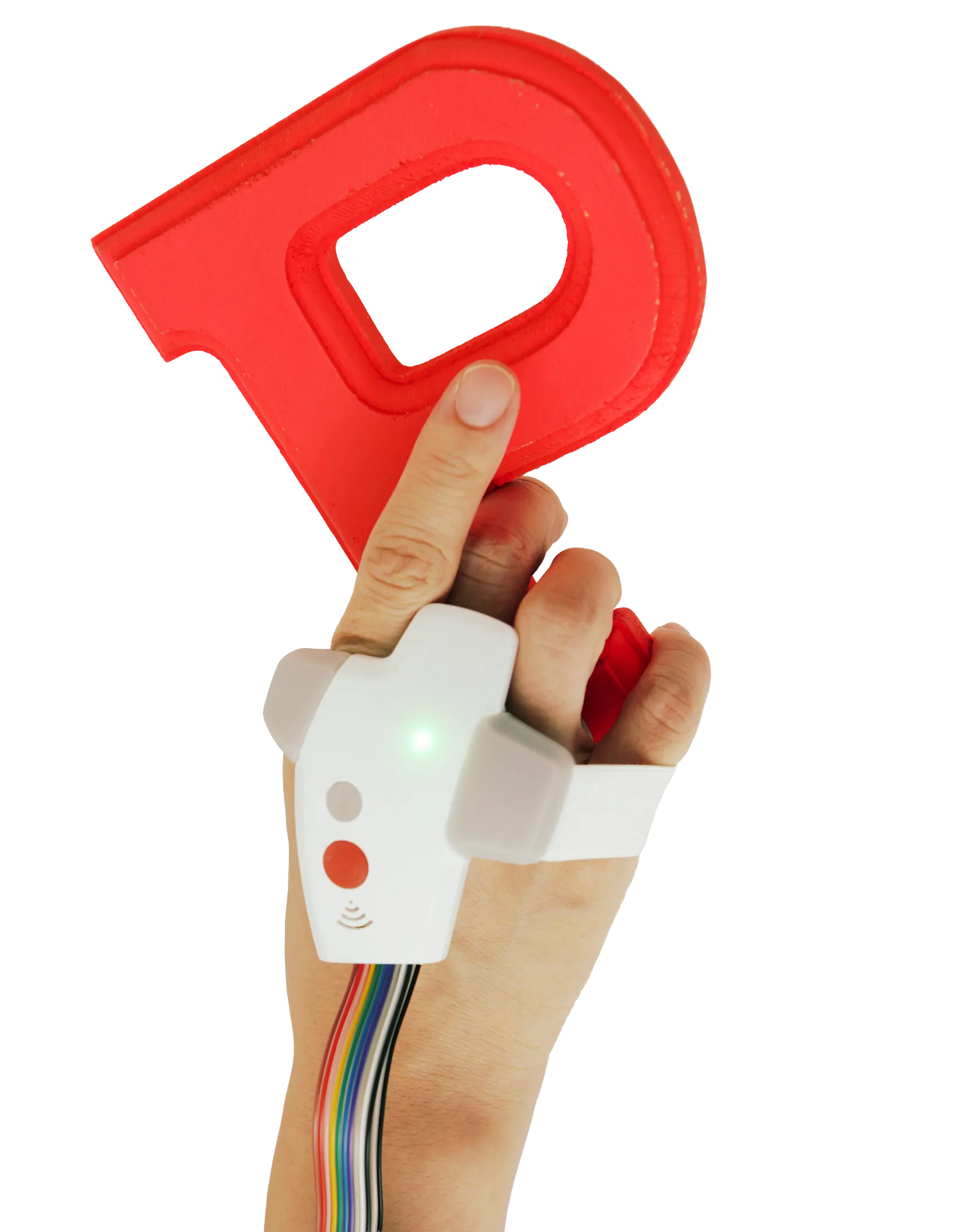 Hand holding an RFID-tagged wooden alphabet P and wearing a custom device on the knuckle side with two buttons and an LED lit