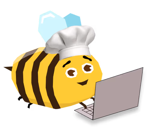 Mosolygó méhecske szakácssapkával, amint laptopot használ.