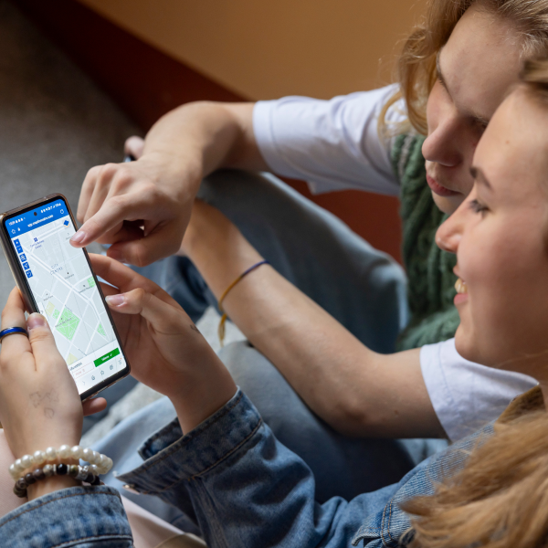 A tablet with a screenshot of a Maptionnaire survey used for community engagement