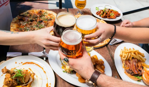People holding beer
