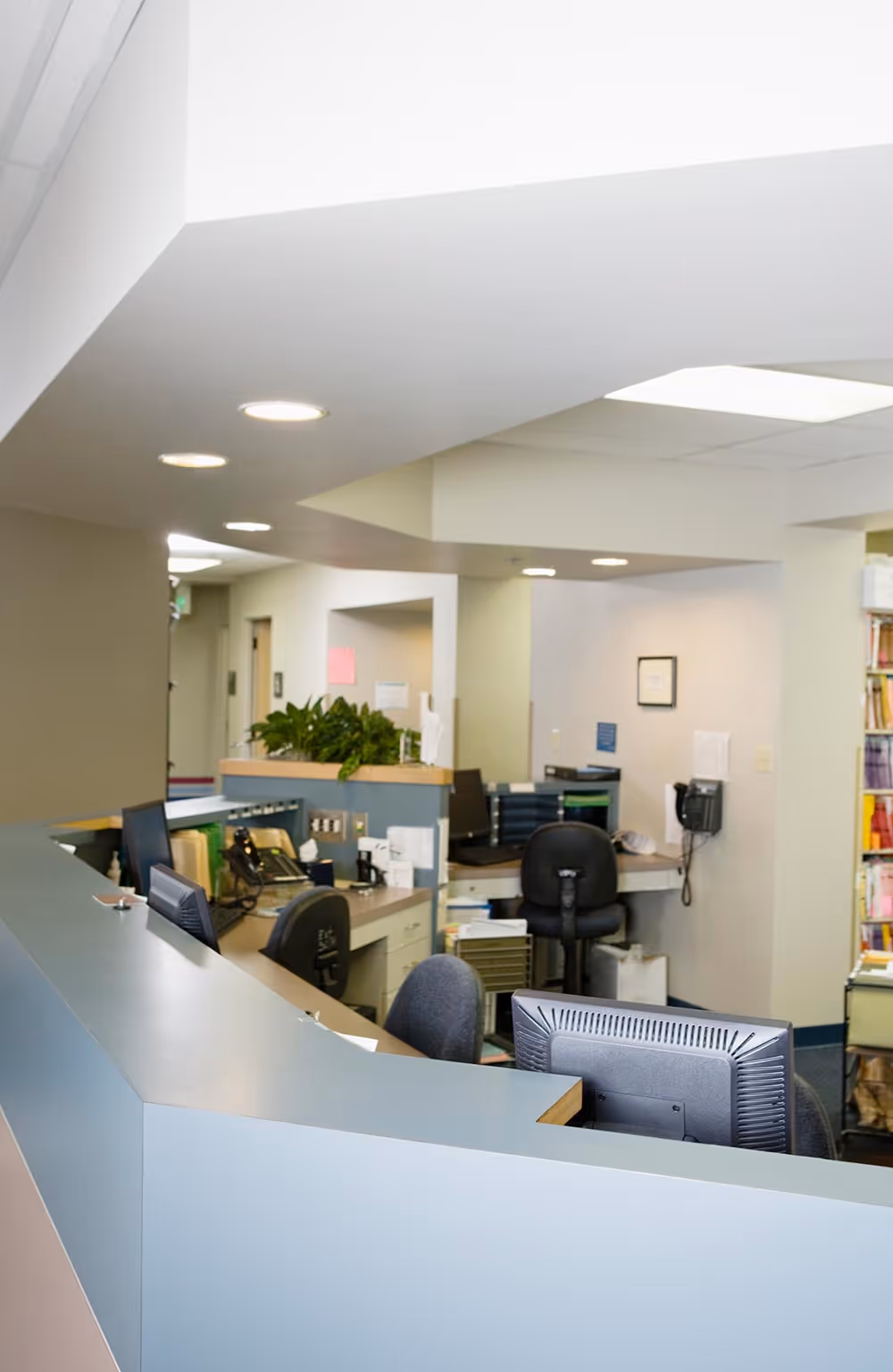 A front desk office at a building where reception is located.