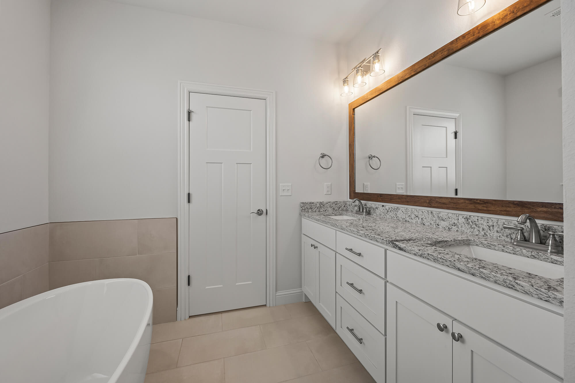 Beckham 3car E1 - Primary Bath (Vanity & FSTub).jpg
