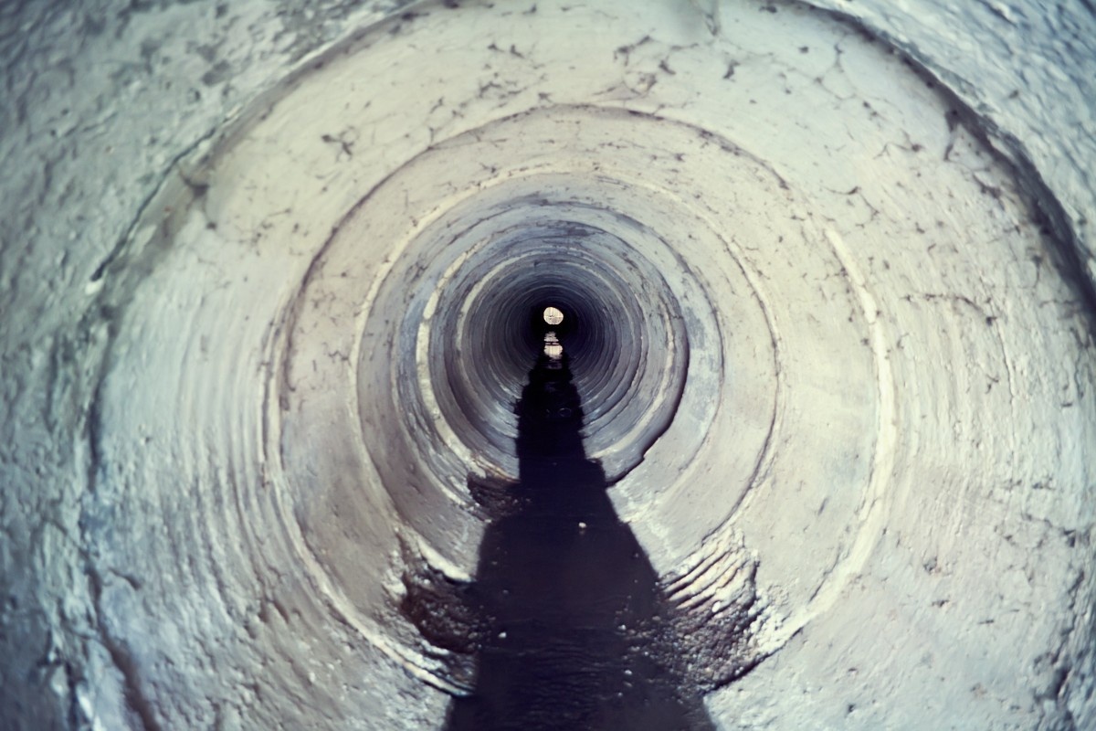 Live HD footage from a sewer inspection camera showing pipe interior condition