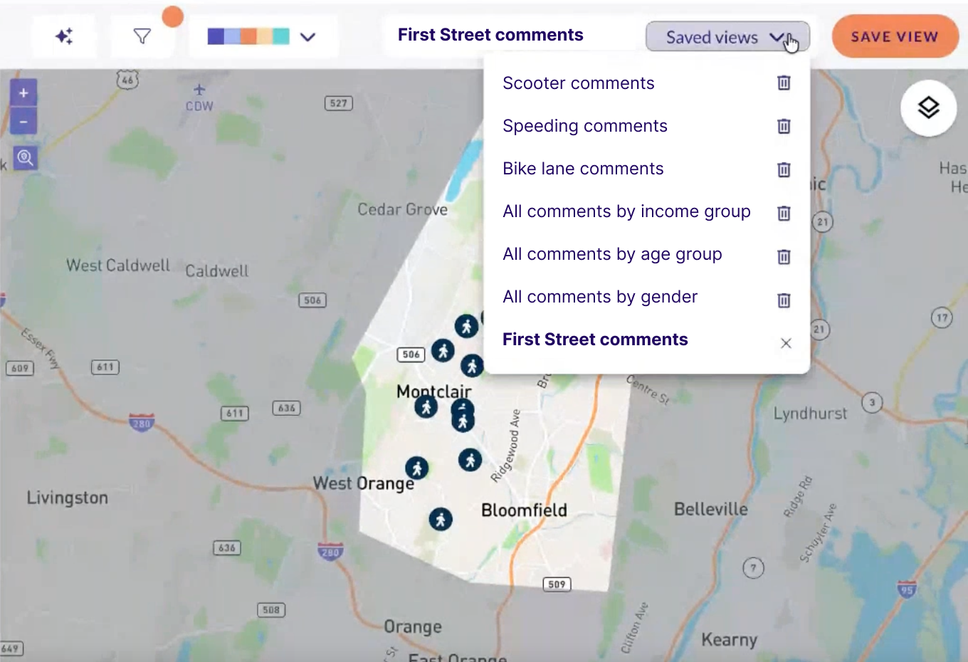Maptionnaire map with a drawn boundary and the Saved views menu open, listing seven saved analyses including First Street comments