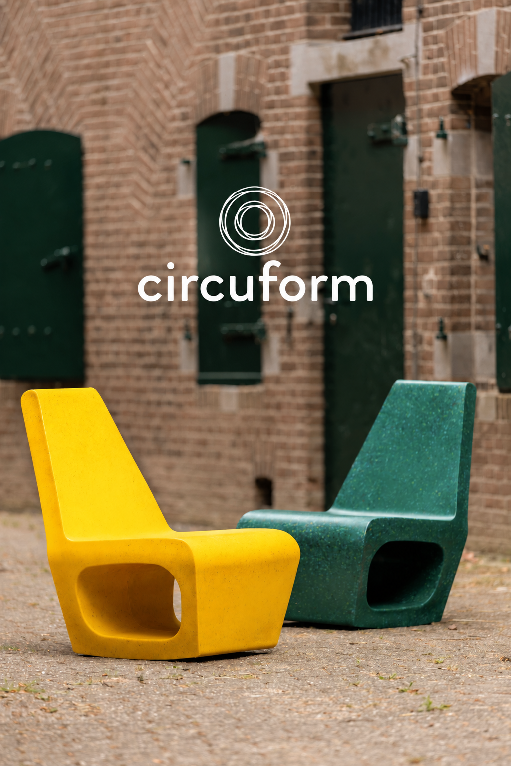 An image of designer Ineke Hans holding the chair as if it where to be recycled.