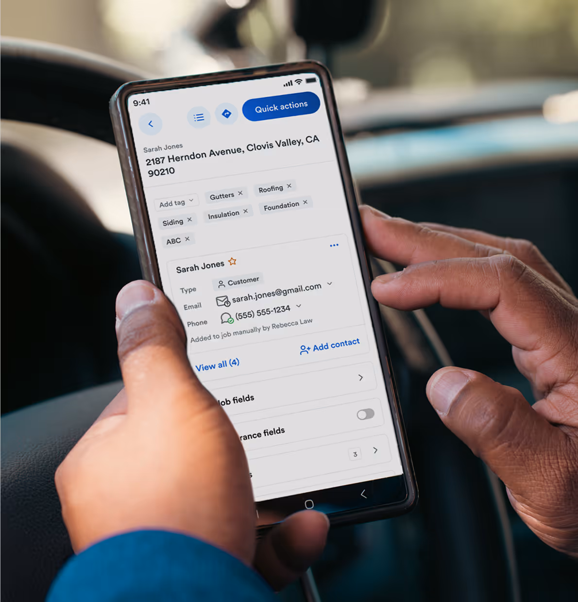 Two overlapping promotional cards; one blue card from roofr advertising 10 free measurement reports, and one maroon card from SRS Distribution valued at $500 for materials.