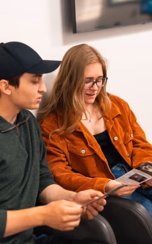 Optometrist at Merivale Vision Care performing an exam for a client who requires contact lenses.