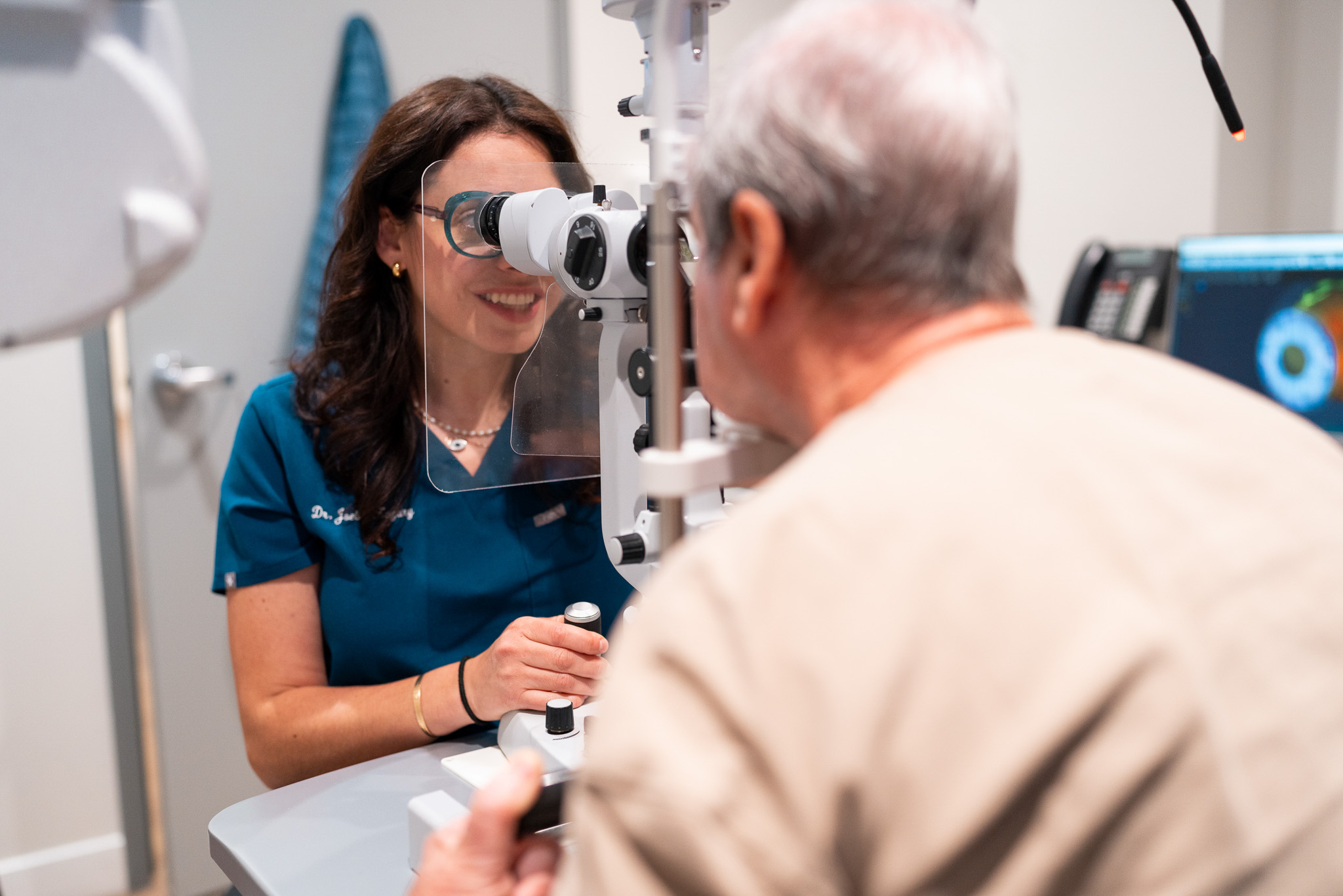 Senior getting their eye exam done at Merivale Vision Care