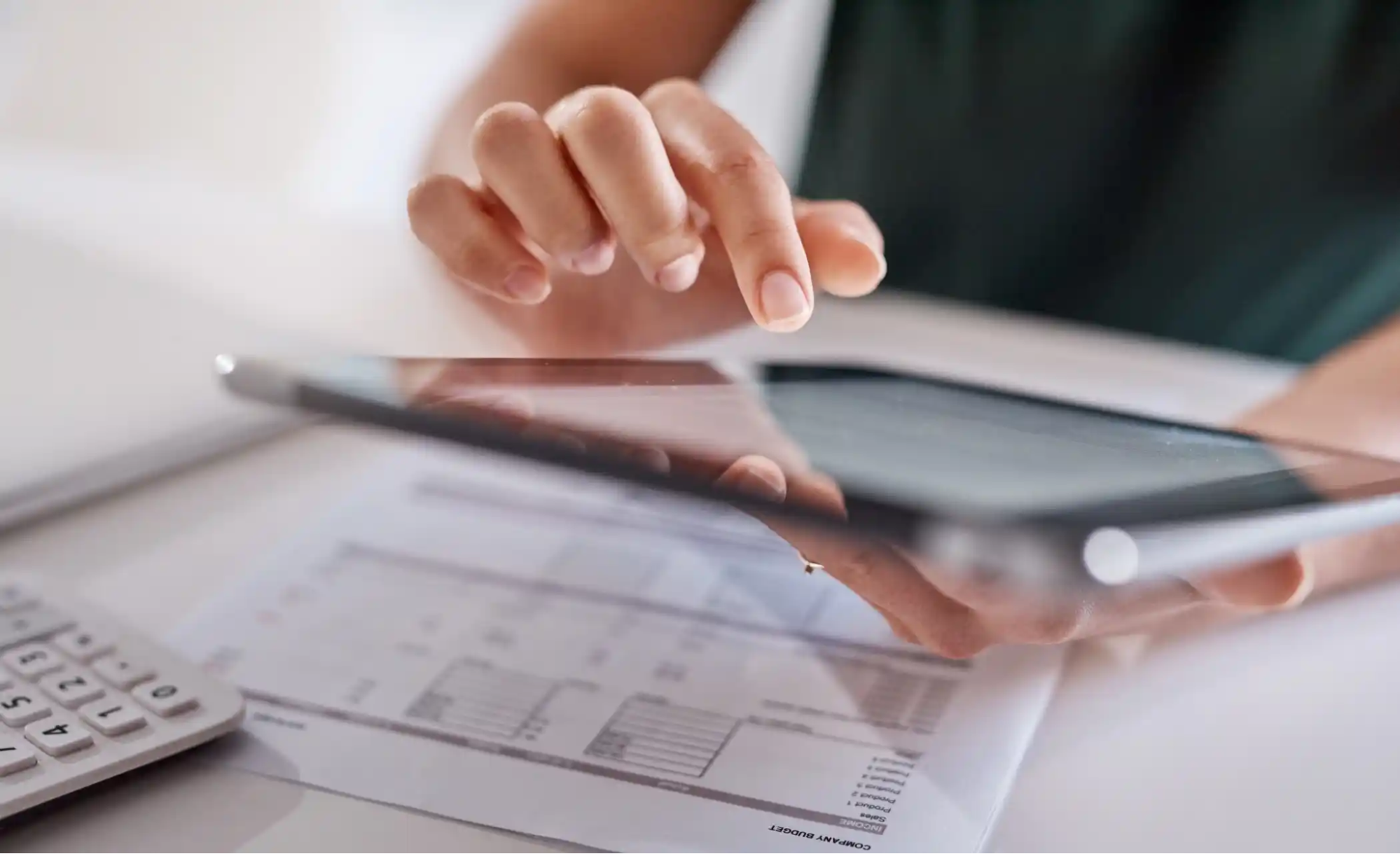 a woman computing on her device