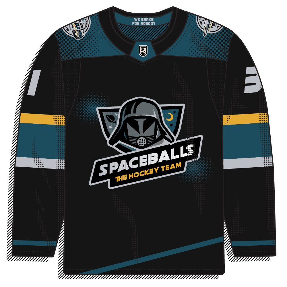 Black body with a teal shoulder yoke and a Dark Helmet-style mascot crest; "We Brake For Nobody" tag on the collar.