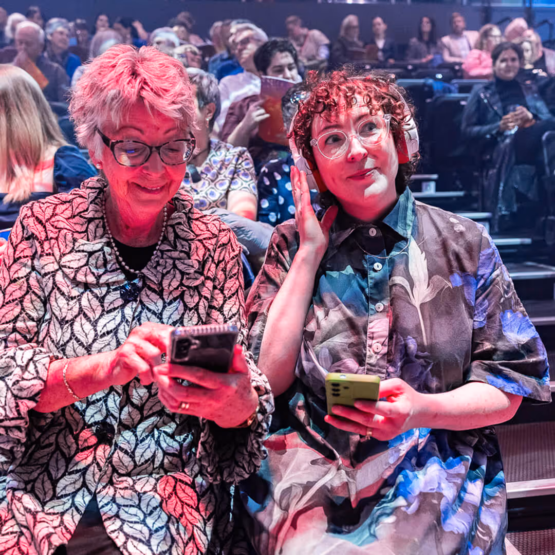 People listening to WOW Audio Guide