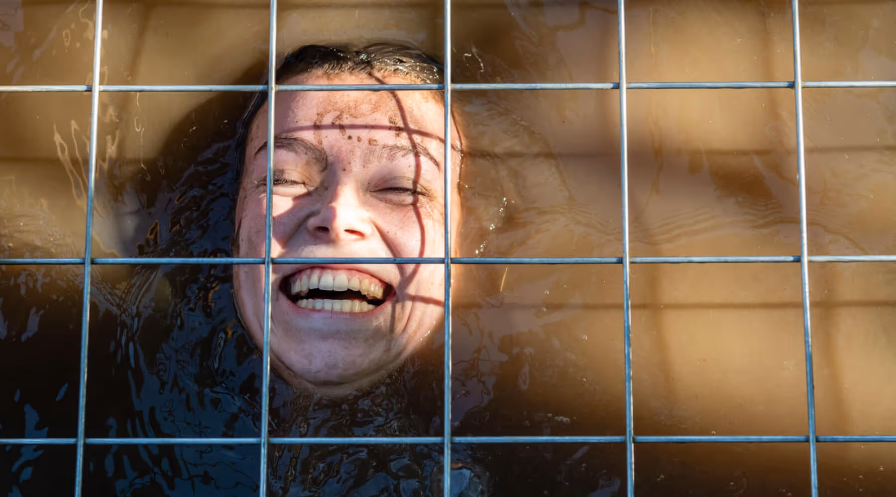 Pictures of people doing a Mud Run of Mud Masters