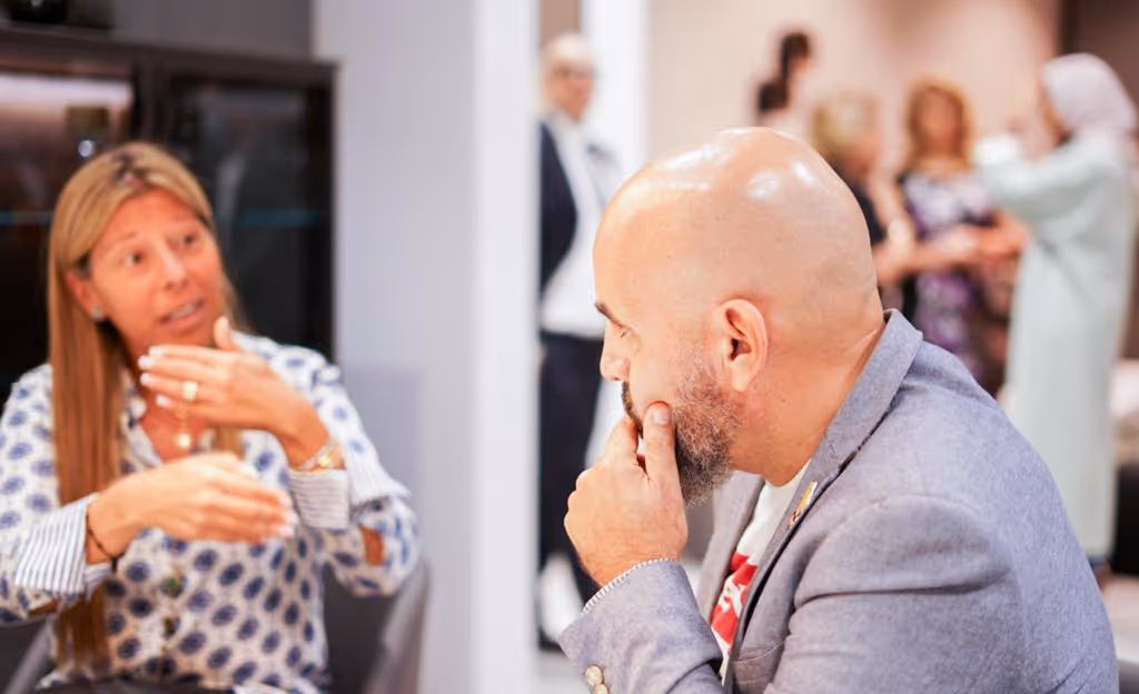 Nemer Sidani and Paula discussing interior design stuff