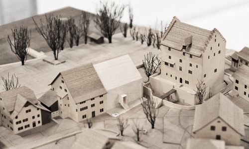 Mehrere Häuser von aussen von oben