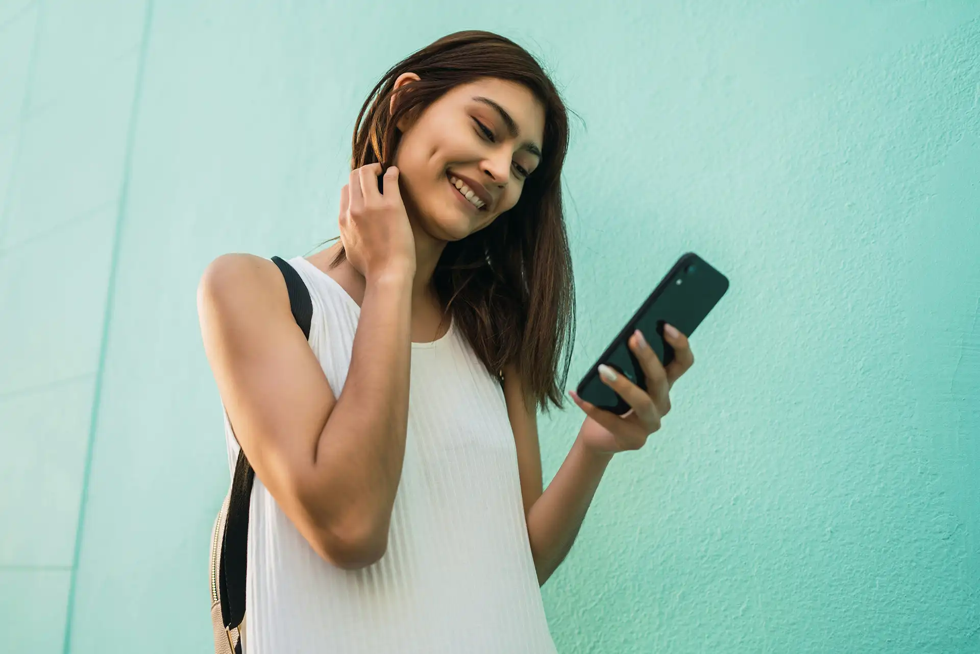 Woman using the Caona Health app