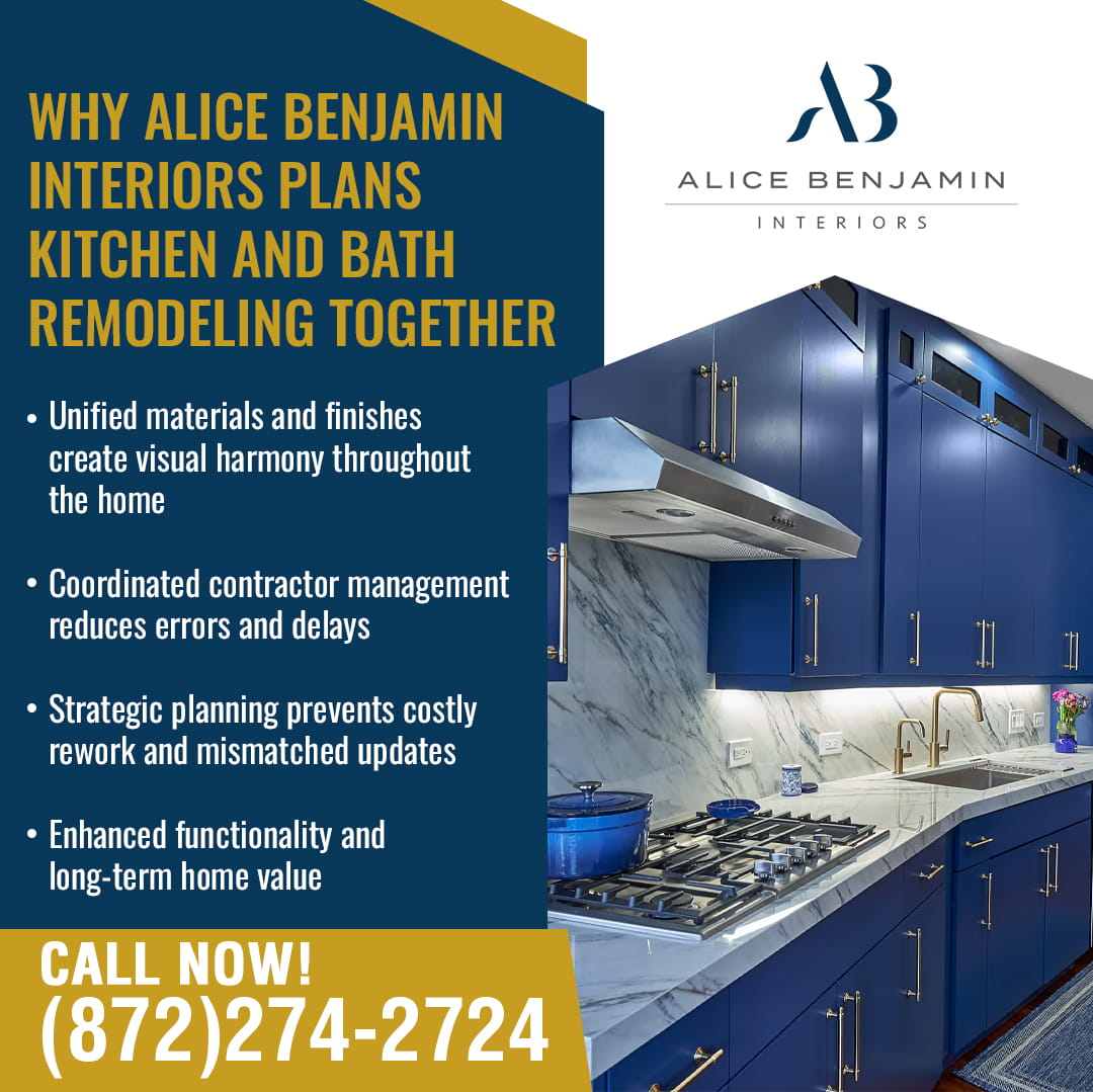 A stunning kitchen with navy blue and white cabinetry, a marble backsplash, and stainless steel appliances, showcasing the coordinated design of Alice Benjamin Interiors.