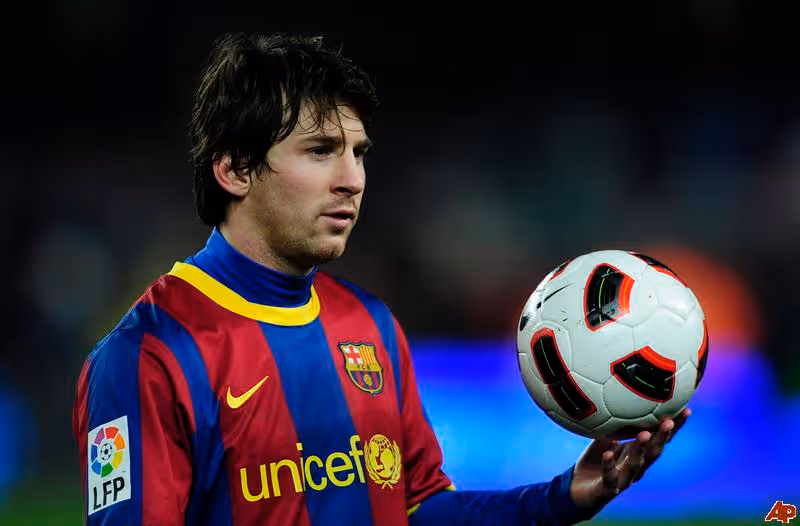 image of soccer player holding a ball