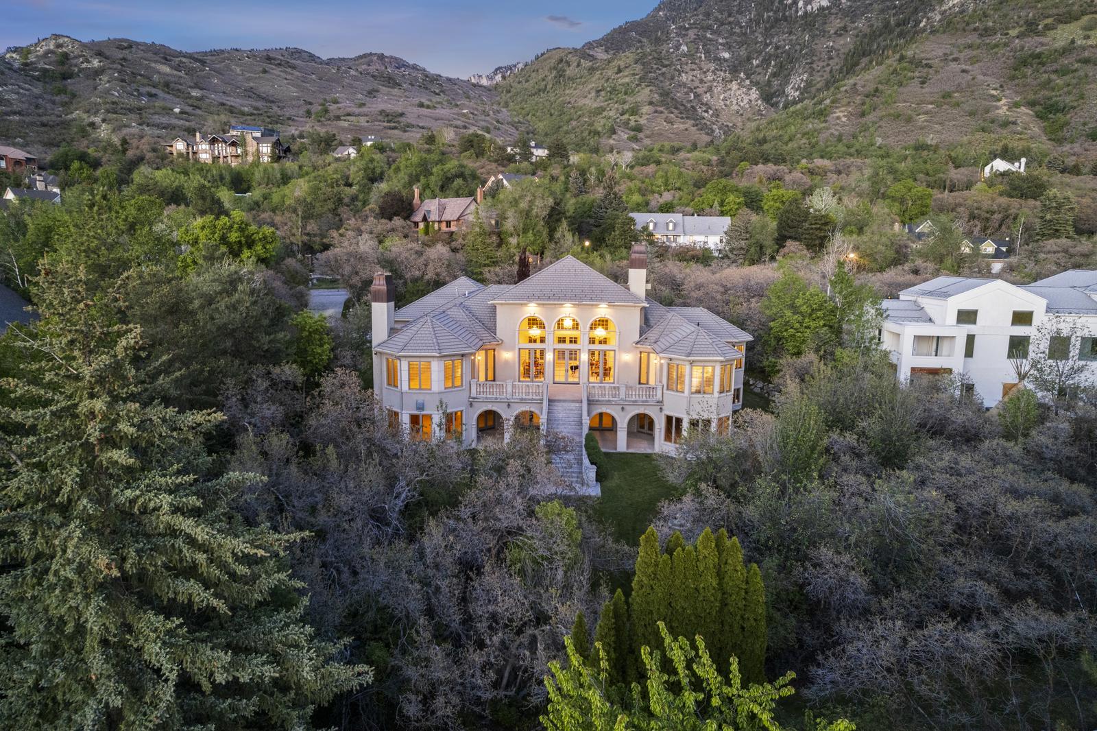 Twilight view of a Sandy home along the Wasatch