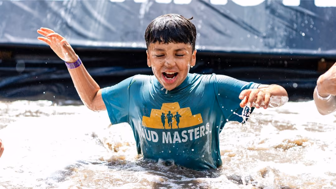 Pictures of people doing a Mud Run of Mud Masters