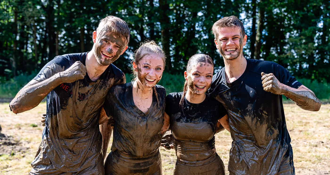 Pictures of people doing a Mud Run of Mud Masters