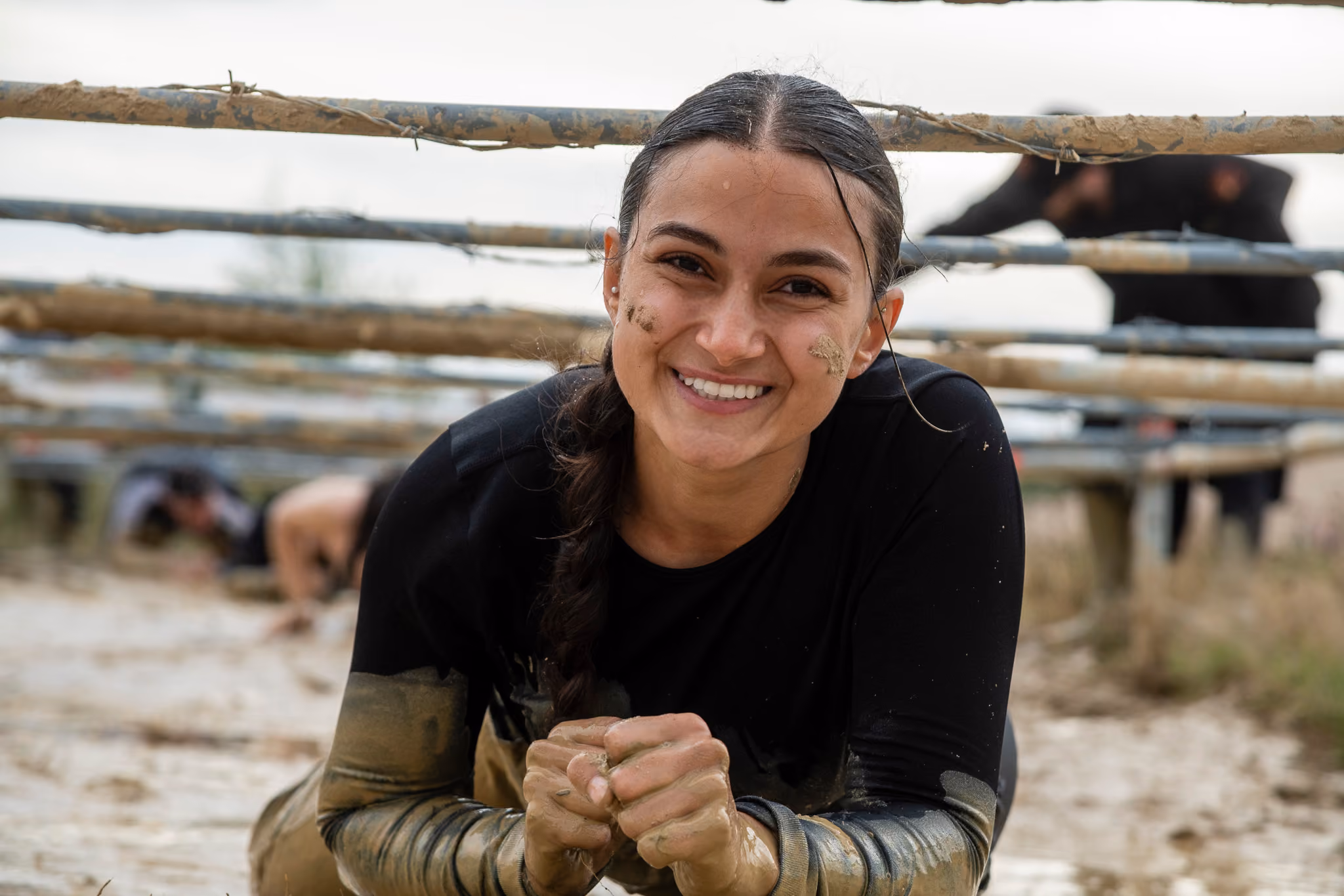 Pictures of people doing a Mud Run of Mud Masters