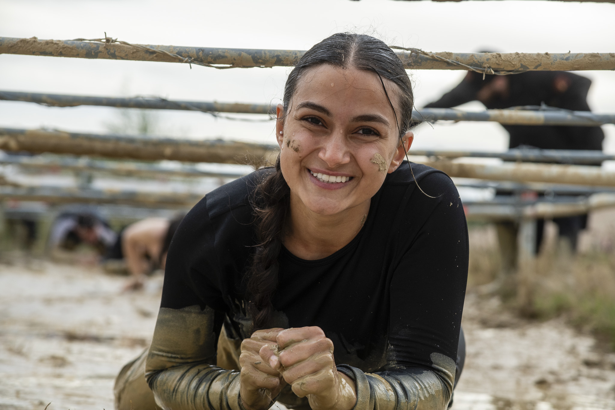 Pictures of people doing a Mud Run of Mud Masters