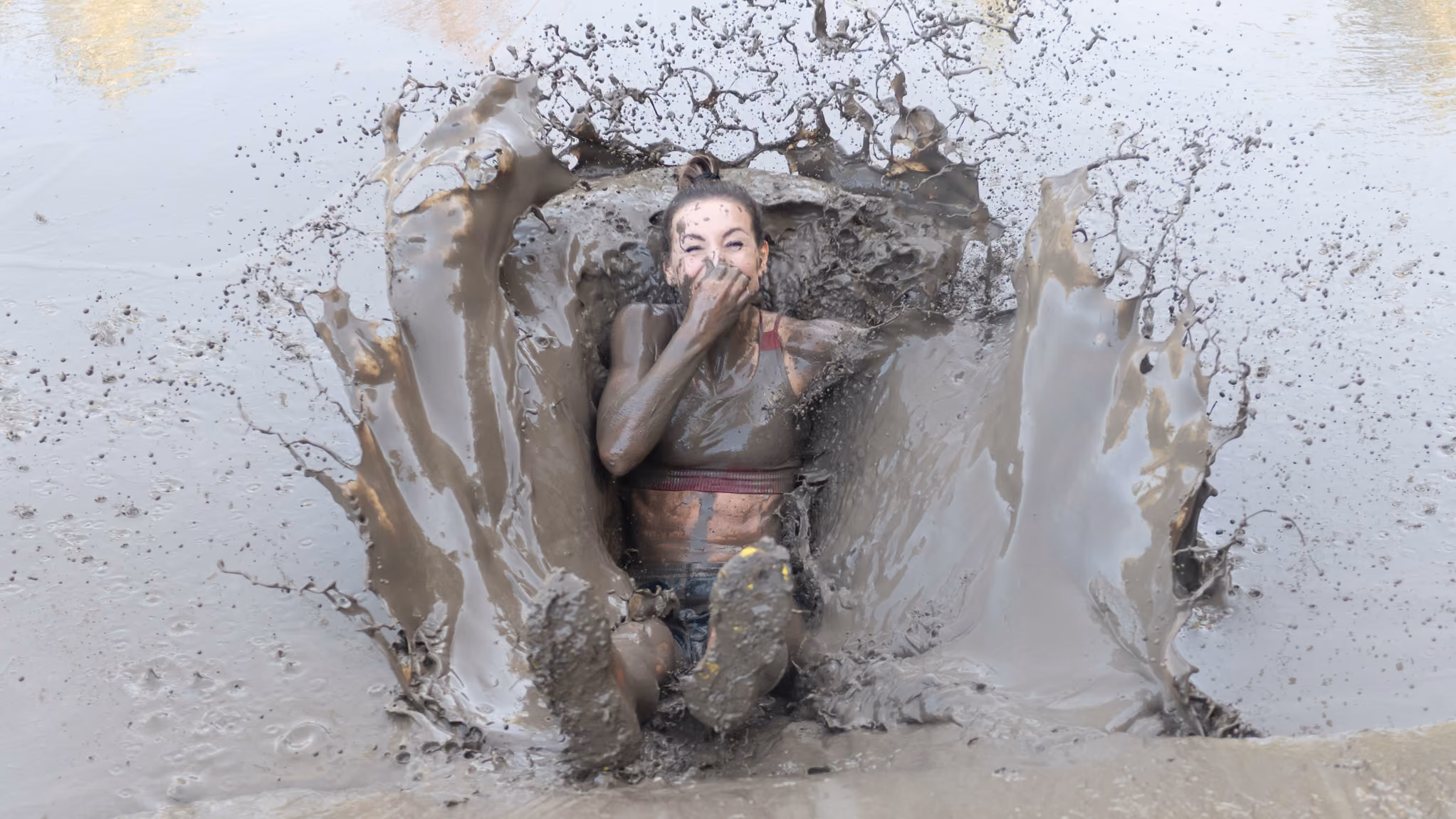 Pictures of people doing a Mud Run of Mud Masters