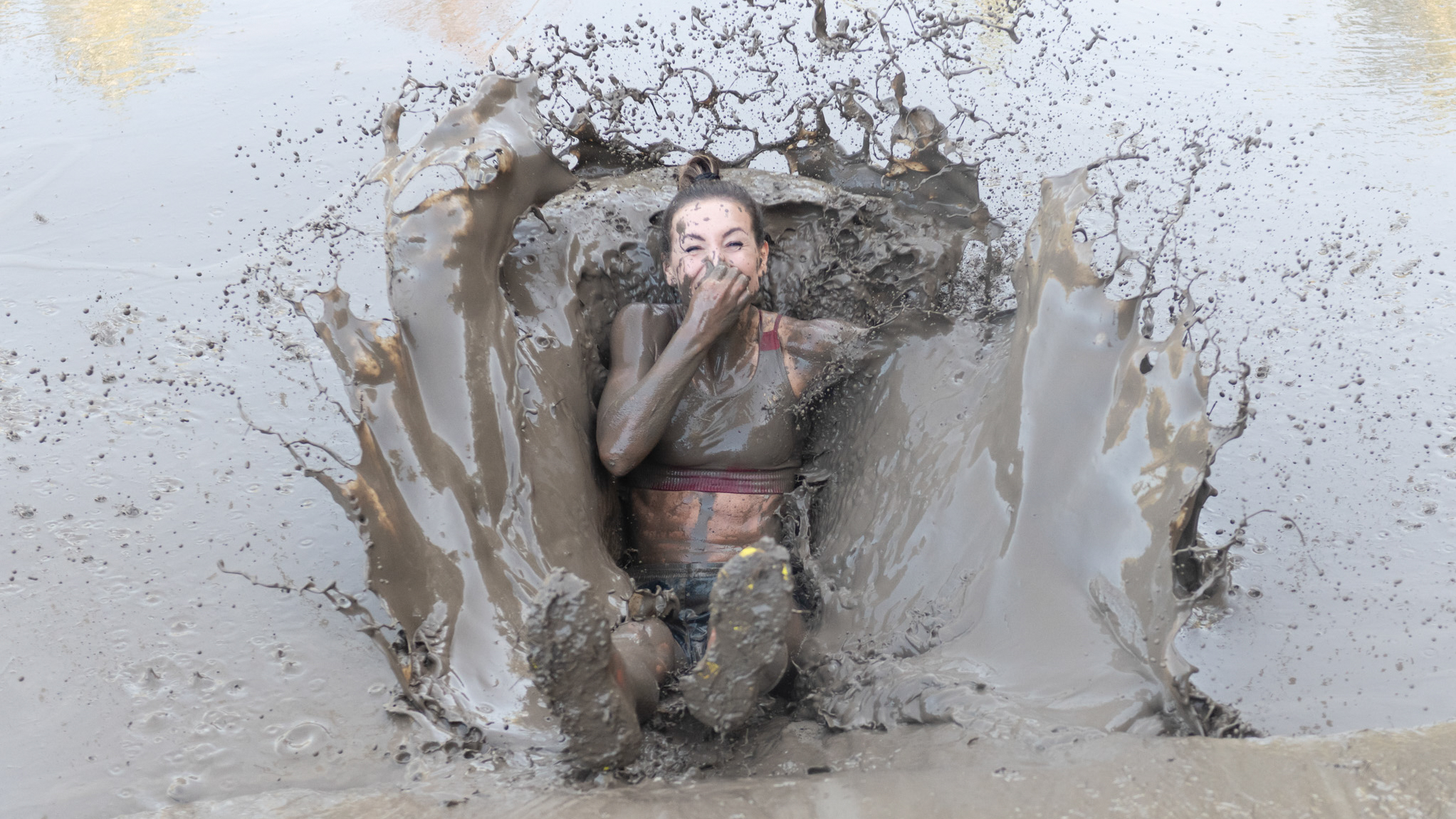 Pictures of people doing a Mud Run of Mud Masters