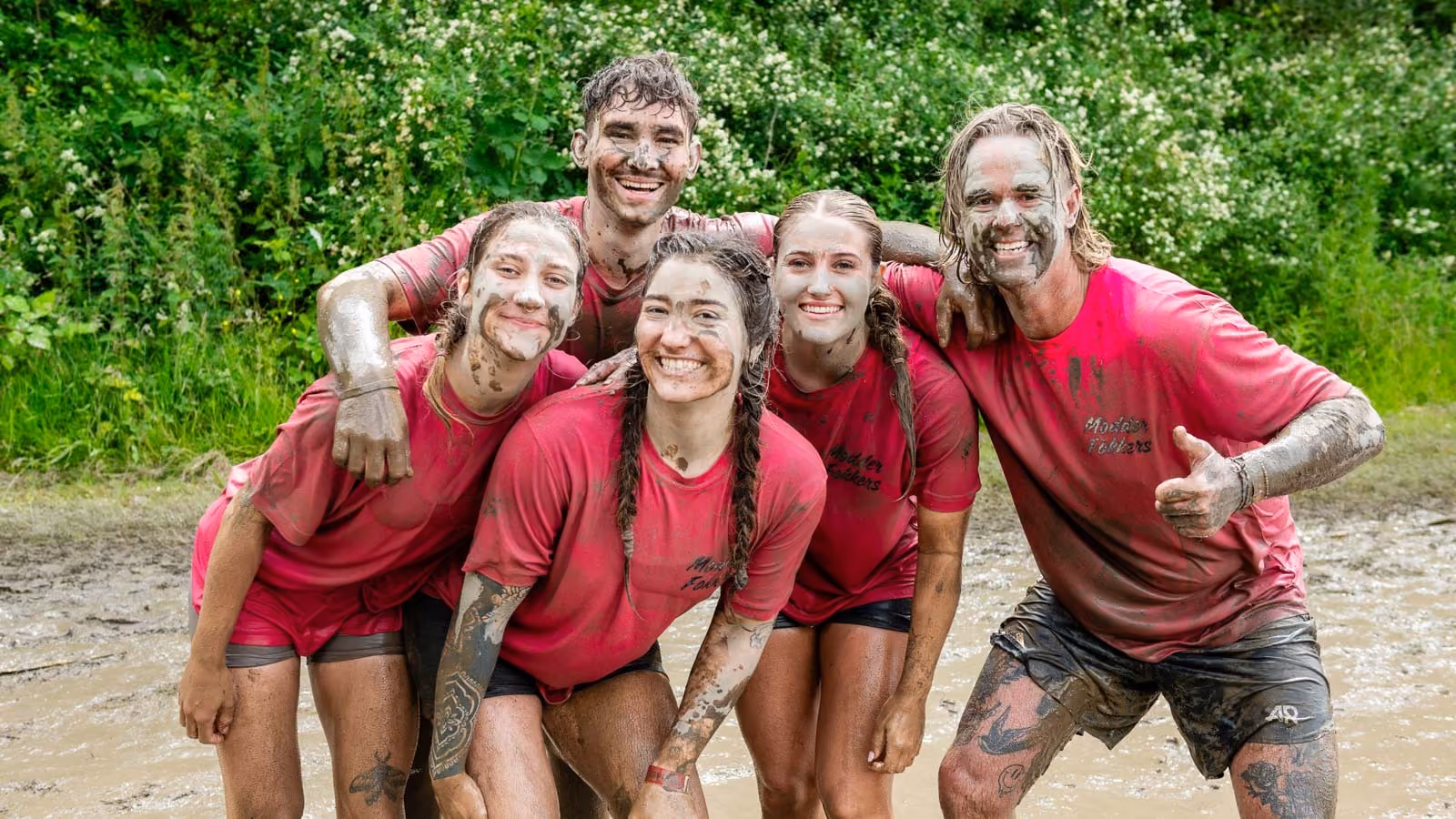 Pictures of people doing a Mud Run of Mud Masters