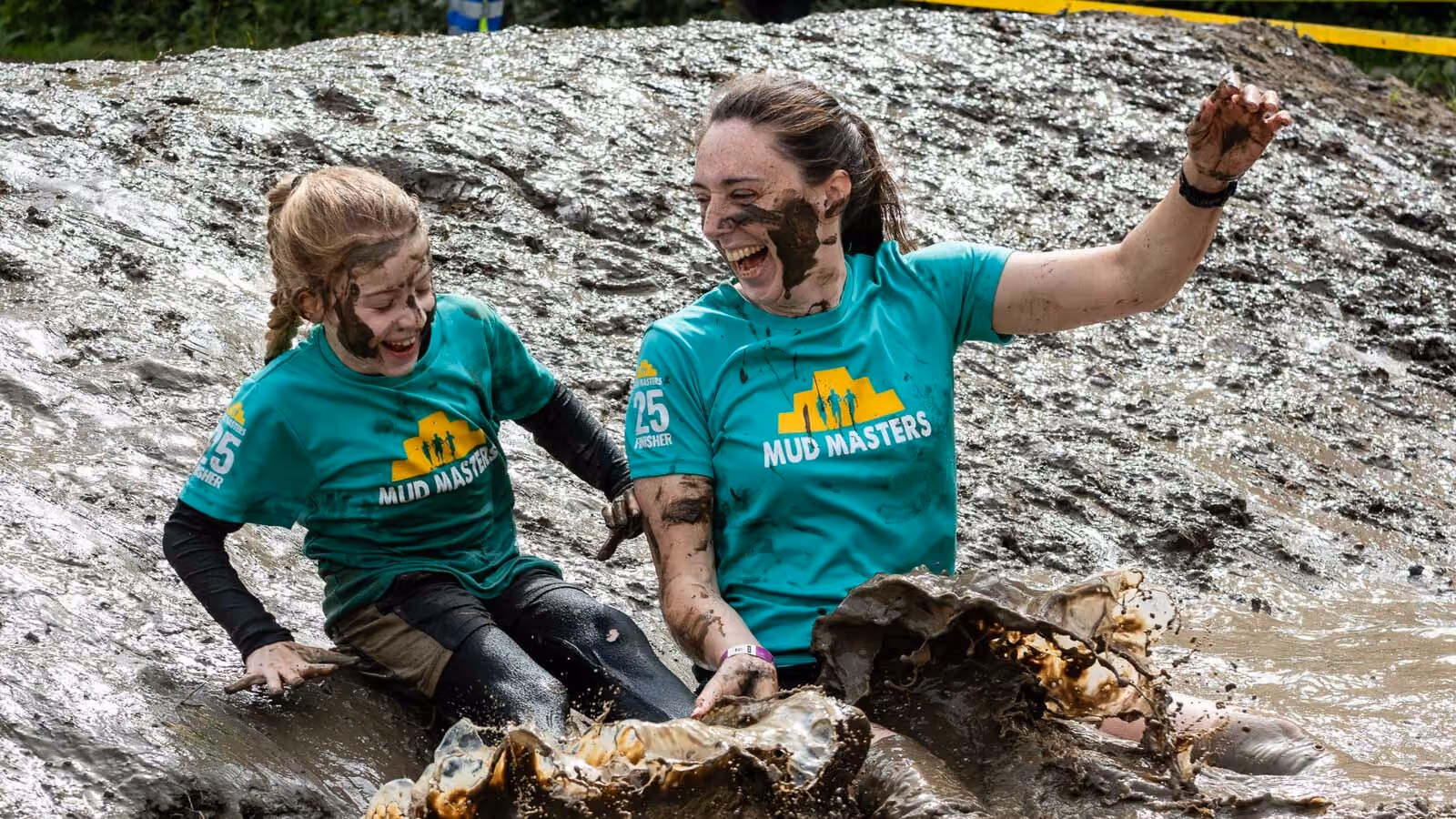 Pictures of people doing a Mud Run of Mud Masters