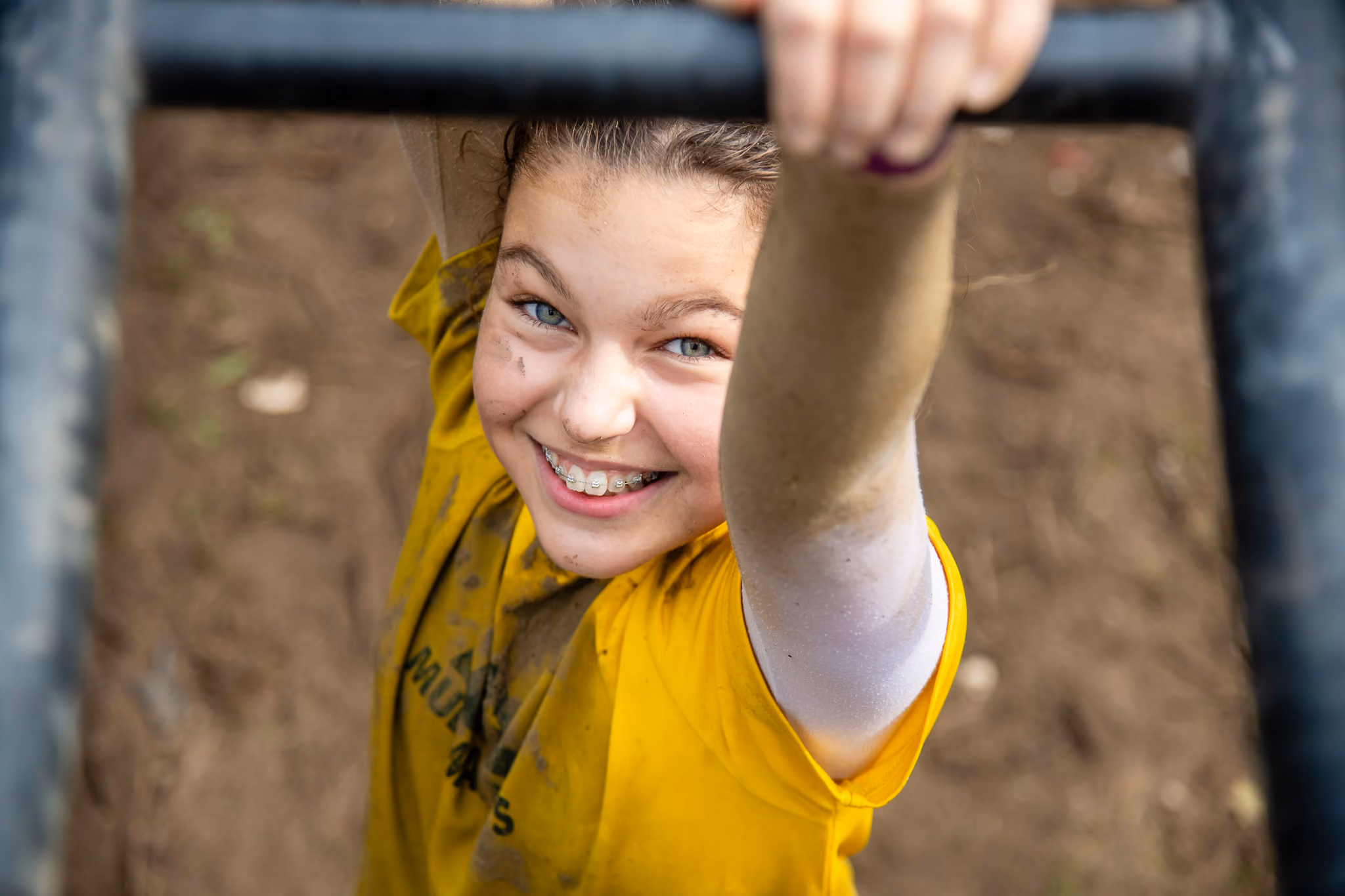 Pictures of people doing a Mud Run of Mud Masters