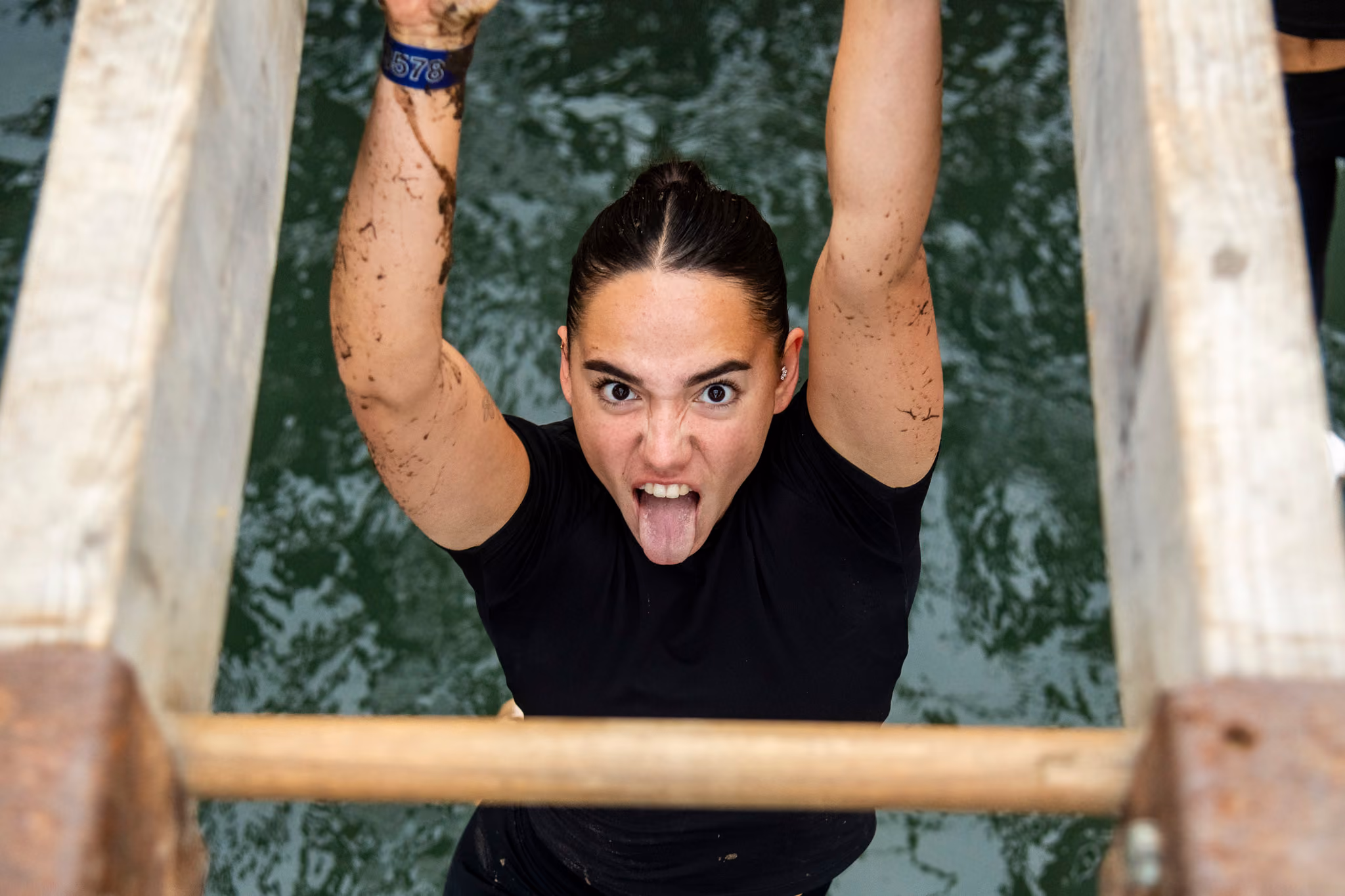 Pictures of people doing a Mud Run of Mud Masters