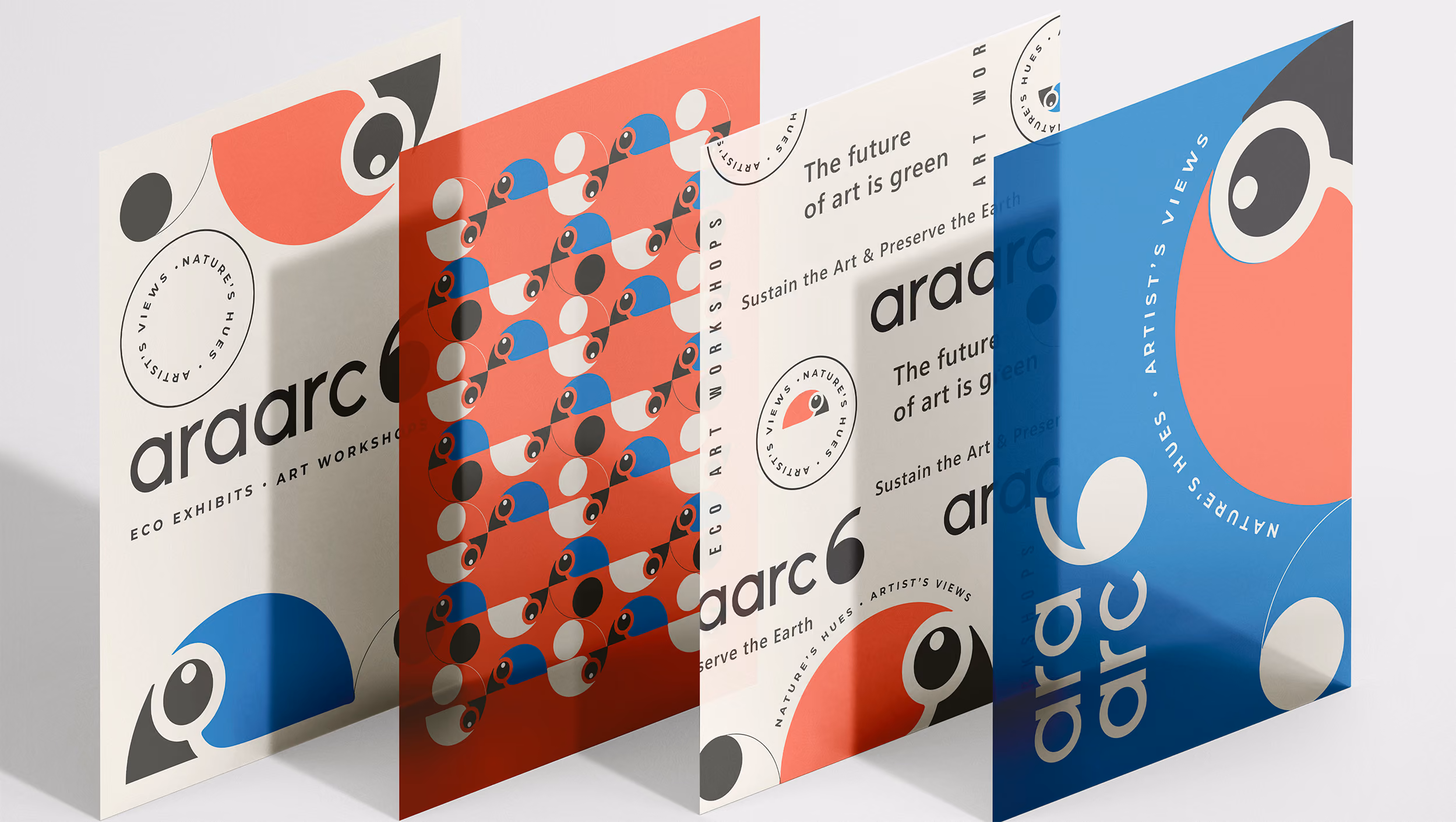 Folded AraArc 6 exhibition brochures featuring macaw graphics and a repeating pattern.